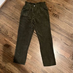 Green corduroy trousers